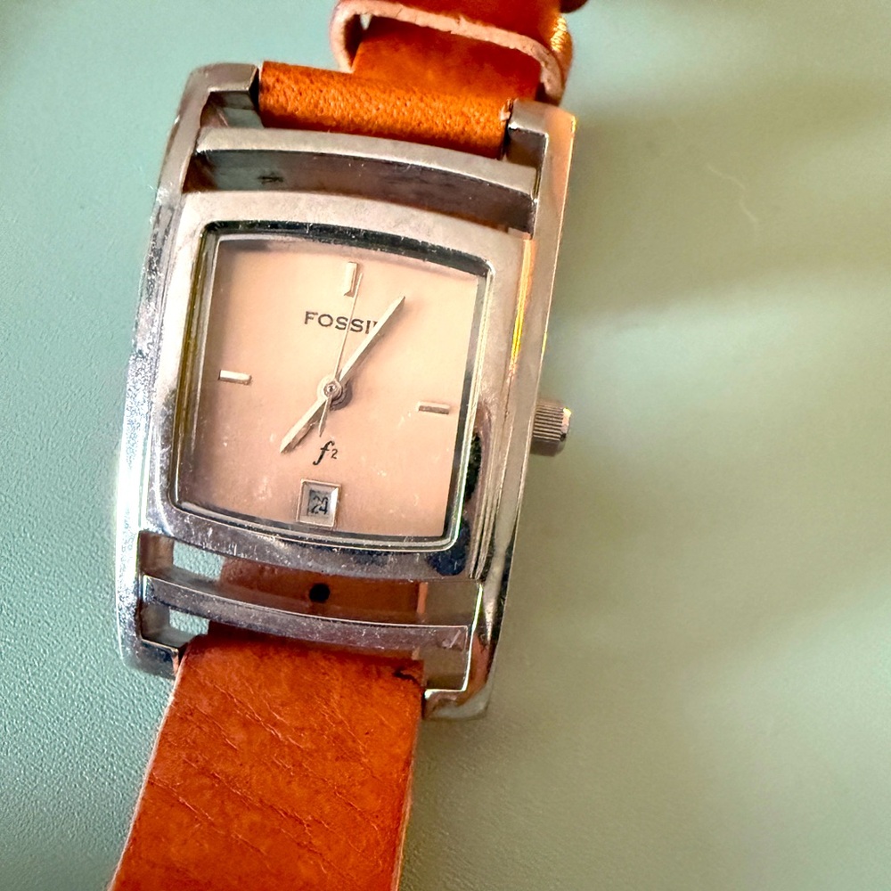 1990’s vintage Fossil leather watch.  Marked on back with model number.